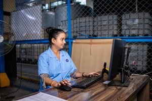 Logistics specialist working with digital documentation in a warehouse