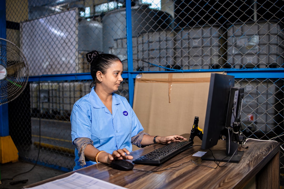 Logistics specialist working with digital documentation in a warehouse